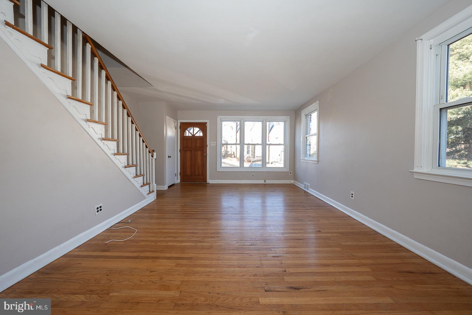 601 Briarcliff Road Upper Darby, PA 19082 - Photo 15 of 63 a view of an entryway with wooden floor and stairs