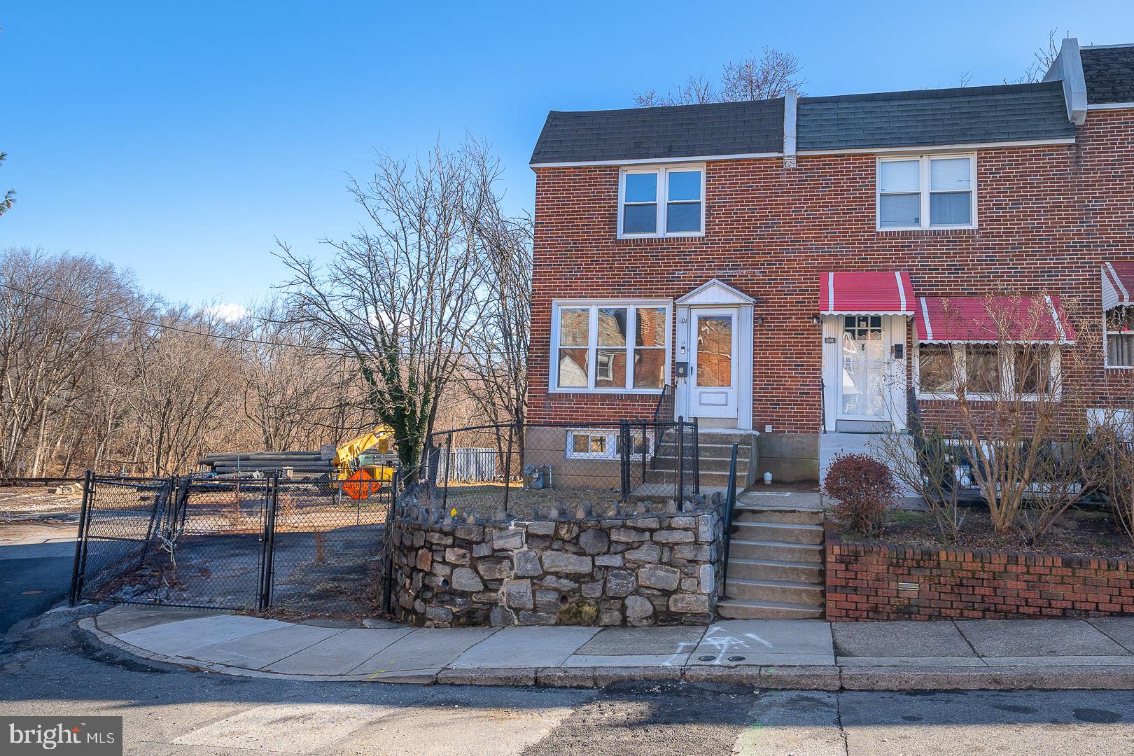 601 Briarcliff Road Upper Darby, PA 19082 - Photo 2 of 63 a front view of a house with garden