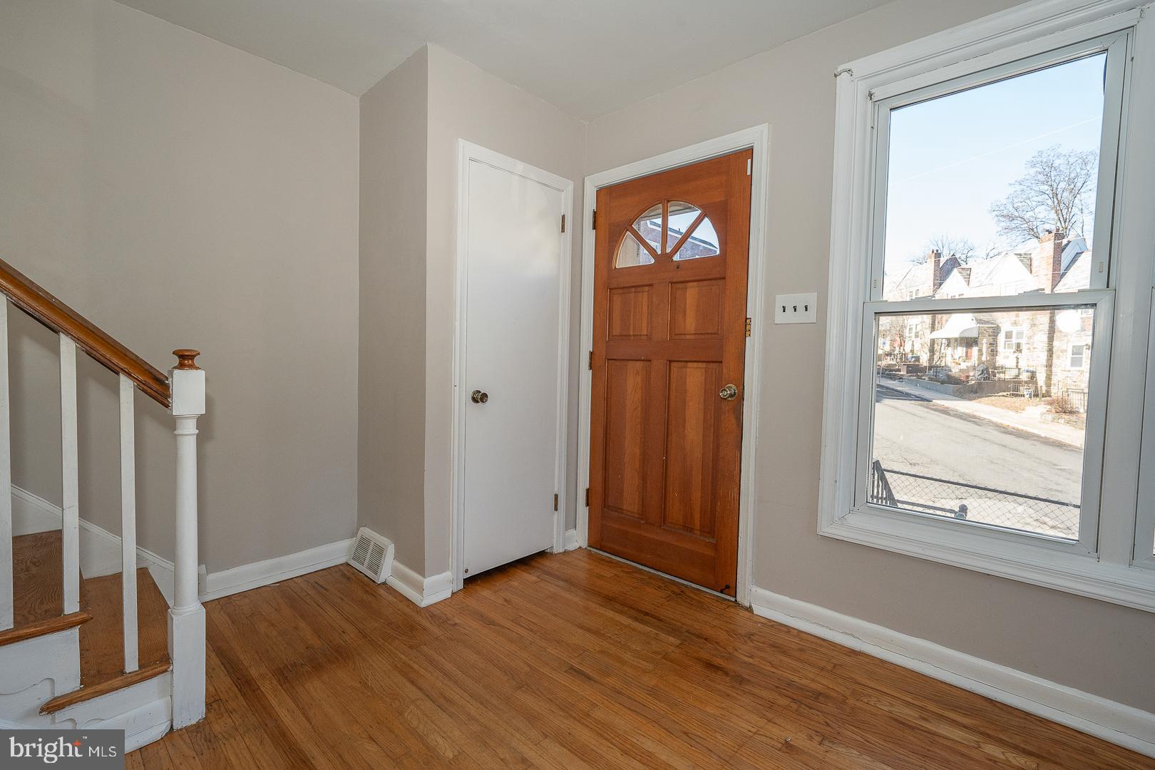 601 Briarcliff Road Upper Darby, PA 19082 - Photo 10 of 63 an empty room with wooden floor and a window