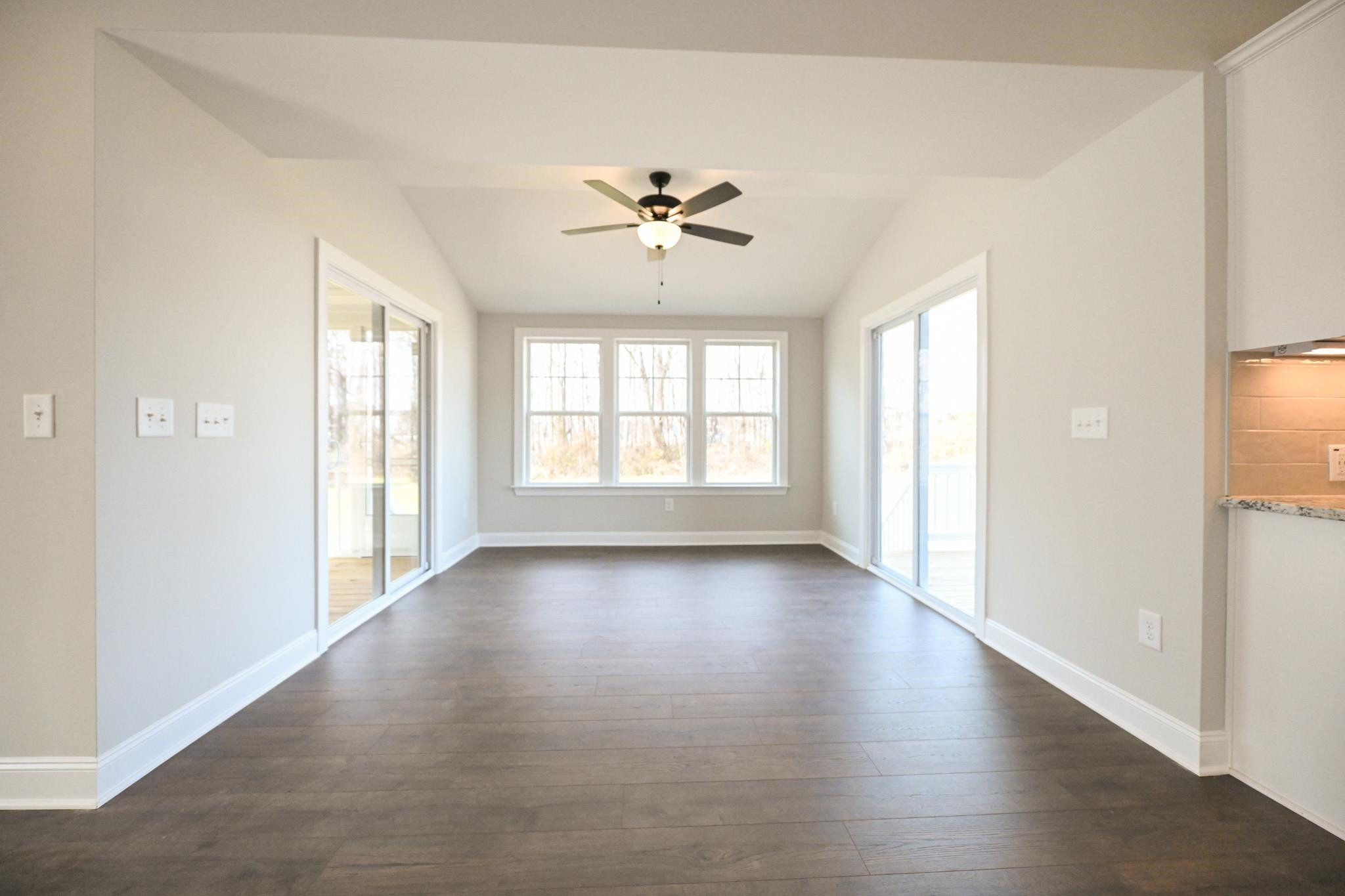 110 Freewill Place Raleigh, NC 27603 - Photo 17 of 39 wooden floor in an empty room with a window