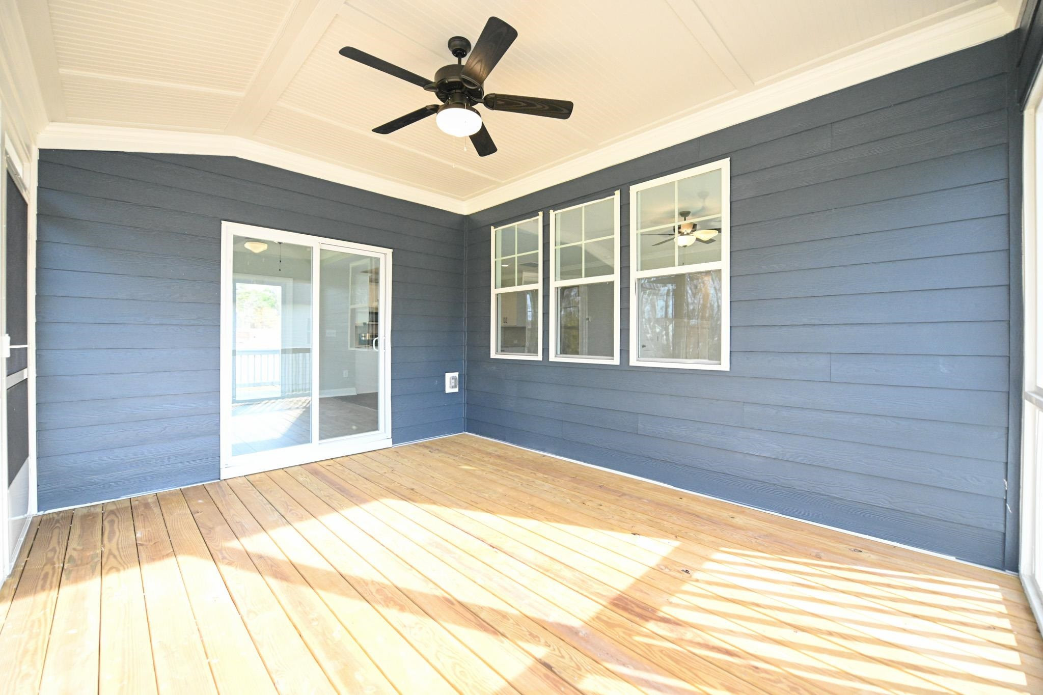 110 Freewill Place Raleigh, NC 27603 - Photo 34 of 39 a bedroom with a bed and a large window