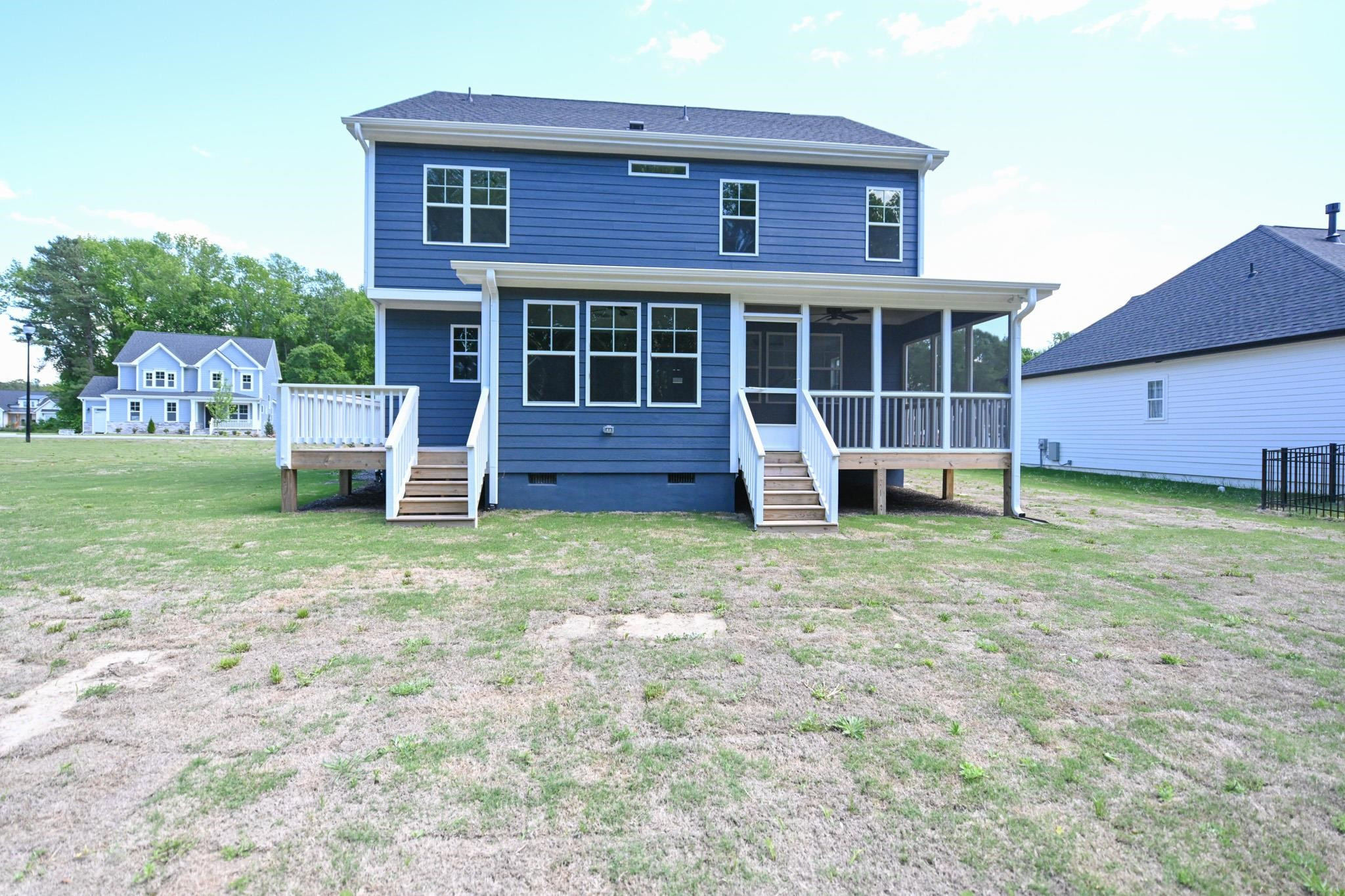 110 Freewill Place Raleigh, NC 27603 - Photo 36 of 39 a front view of a house with a garden