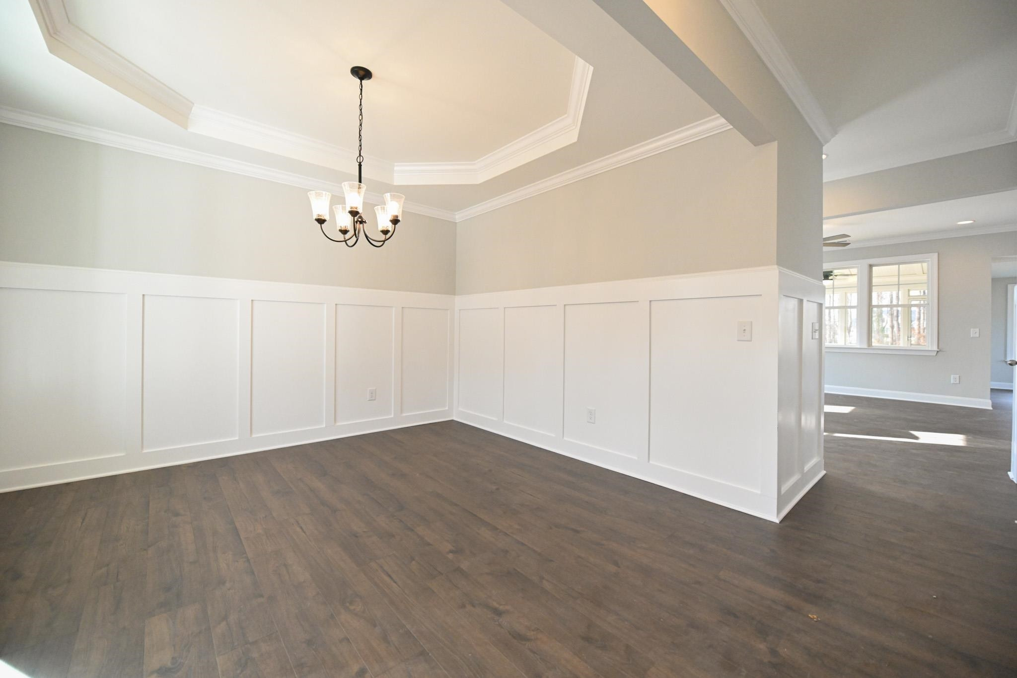 110 Freewill Place Raleigh, NC 27603 - Photo 6 of 39 a view of a room with wooden floor closet and windows
