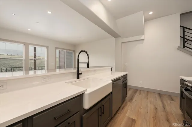 a view of a bathroom with a sink and mirror