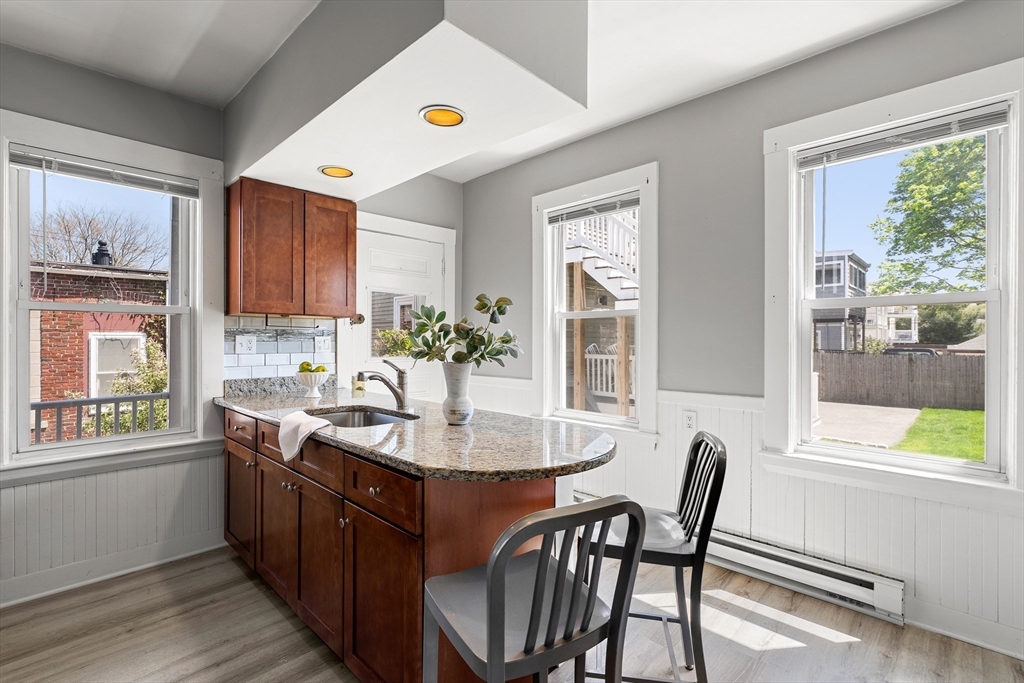 2 Thorndike Street, Unit 2 Arlington, MA 02474 - Photo 13 of 22 a dining room with a window