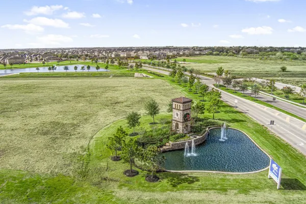 a view of a lake with a big yard