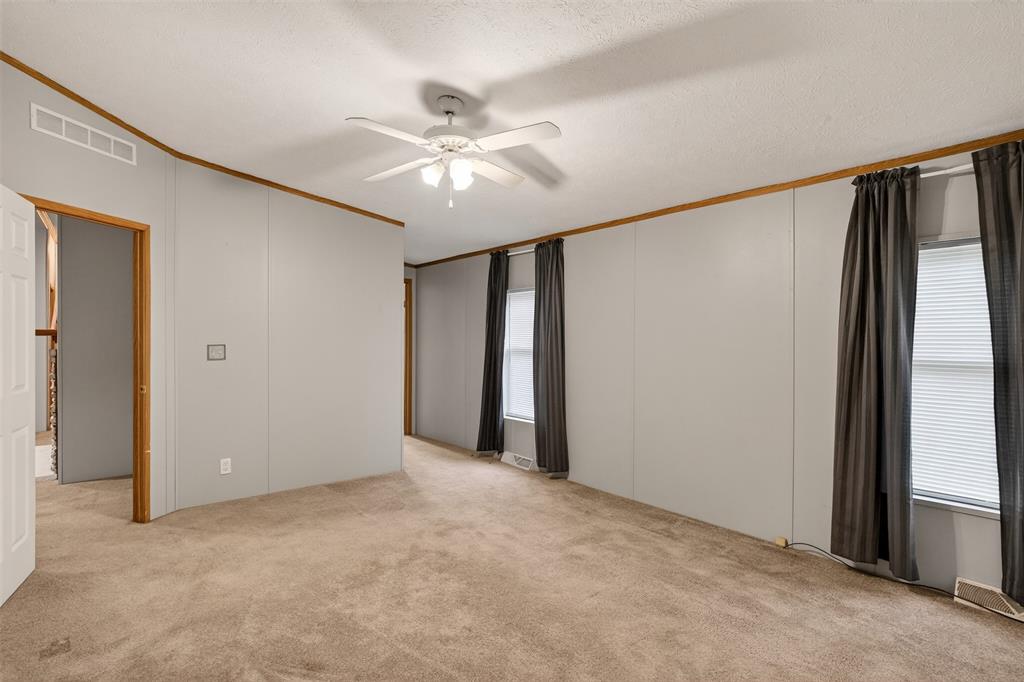 1202 Princeton Road Princeton, LA 71067 - Photo 18 of 32 a view of an empty room with a window