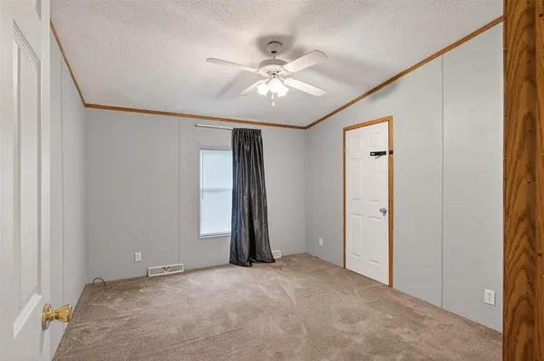 a bathroom with a sink a toilet a mirror and shower