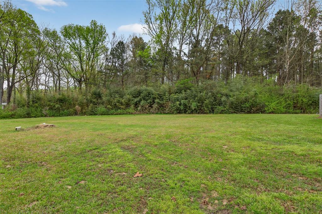 1202 Princeton Road Princeton, LA 71067 - Photo 30 of 32 View of green lawn