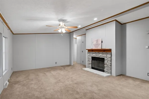 a kitchen with a sink appliances and cabinets