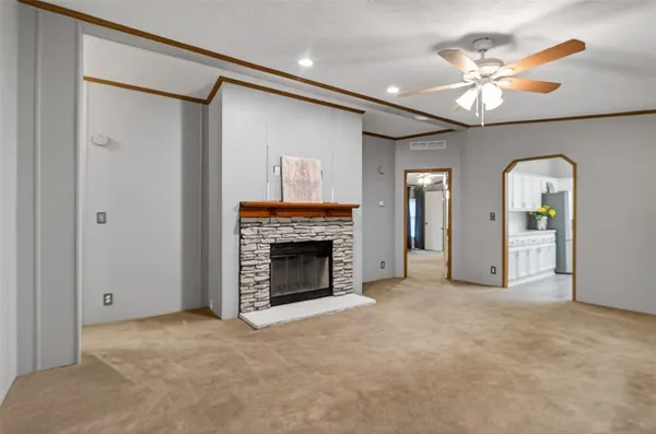 a kitchen with stainless steel appliances a refrigerator sink and cabinets
