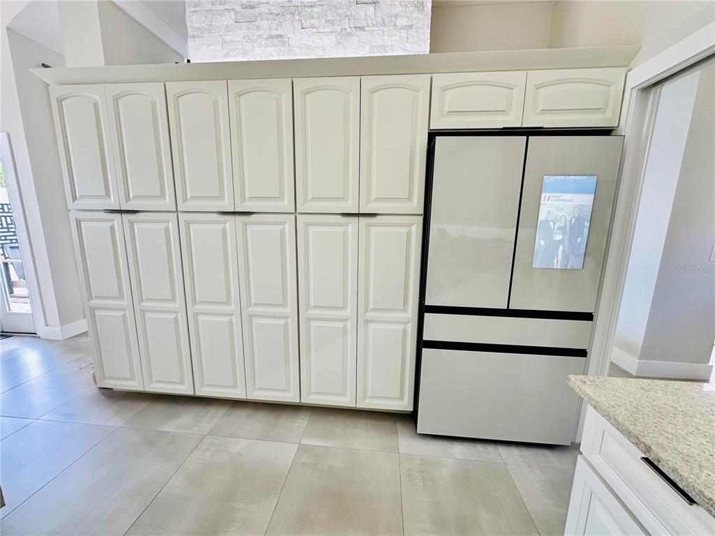 784 South Pennsylvania Avenue Winter Park, FL 32789 - Photo 12 of 29 a view of kitchen with stainless steel appliances granite countertop cabinets and a counter top space