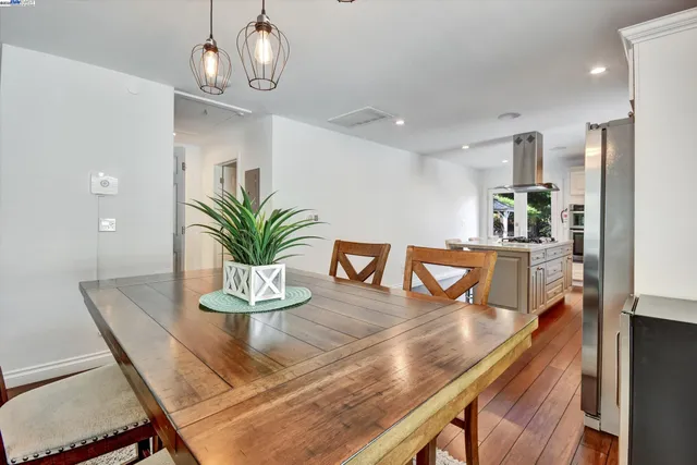 a view of a dining room with furniture