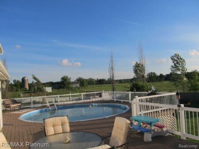 6052 Dutcher Road Howell, MI 48843 - Photo 23 of 27 pool.jpg
