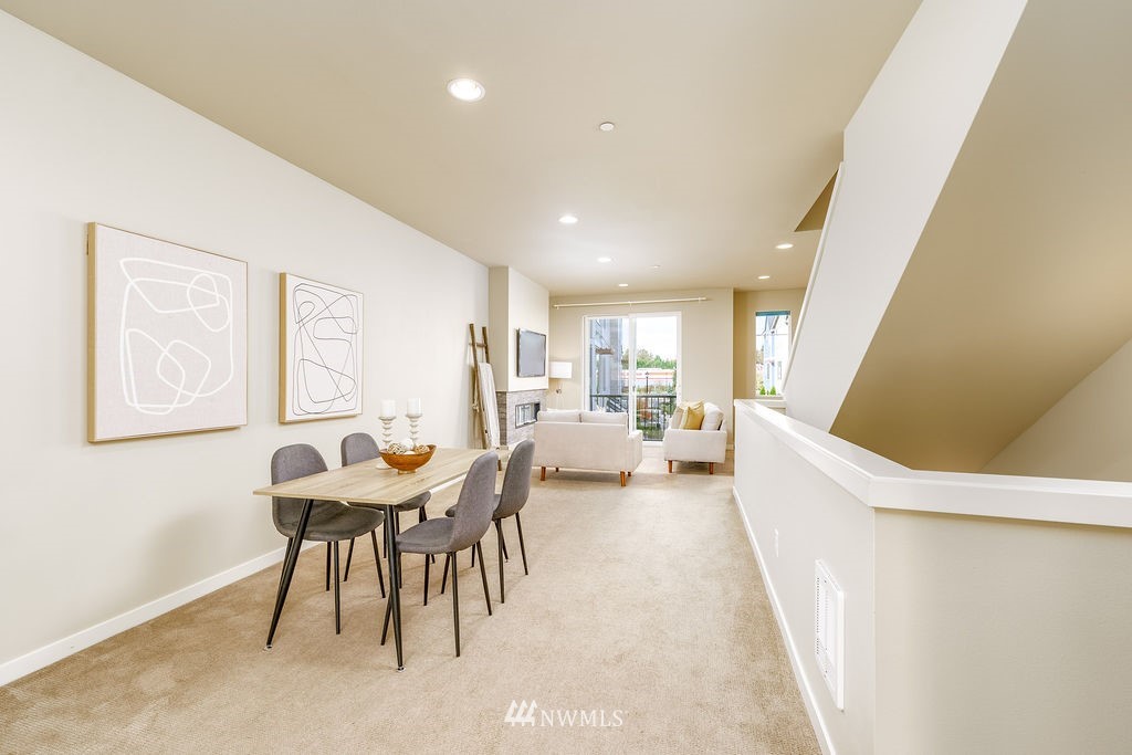 4227 Northeast 3rd Lane Renton, WA 98059 - Photo 5 of 40 a living room with furniture and a wooden floor