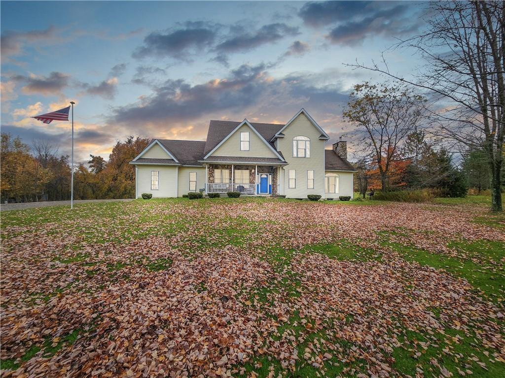 3902 Knoyle Road Erie, PA 16510 - Photo 1 of 25 a front view of a house with a yard