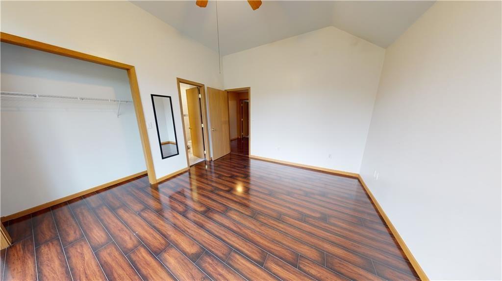 3902 Knoyle Road Erie, PA 16510 - Photo 18 of 25 a view of an empty room with wooden floor and a window