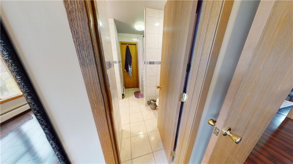 3902 Knoyle Road Erie, PA 16510 - Photo 21 of 25 a view of a bathroom from a door