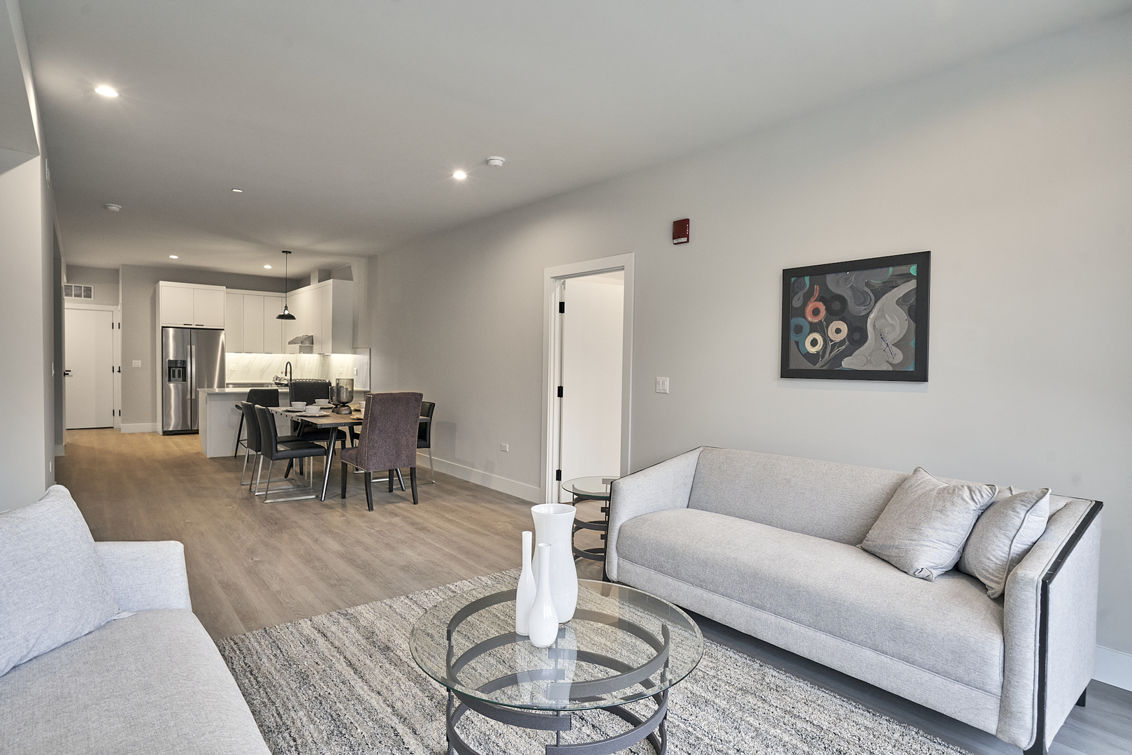 503 East Pershing Road, Unit 203 Chicago, IL 60653 - Photo 22 of 29 a living room with furniture and a table