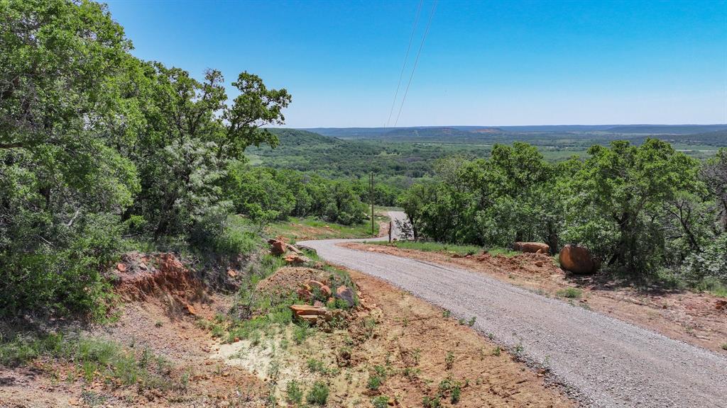 Tbd Lot 18.2 Tbd Road Gordon, TX 76453 - Photo 20 of 40 a view of a road with a yard