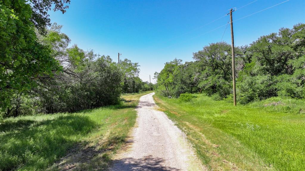 Tbd Lot 18.2 Tbd Road Gordon, TX 76453 - Photo 30 of 40 a backyard of a house with lots of green space