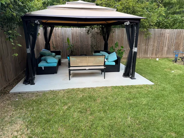 a house view with a outdoor seating space