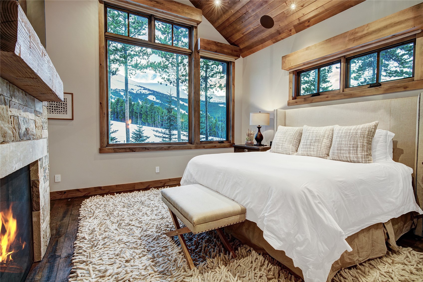 422 Timbertrail Road Breckenridge, CO 80424 - Photo 27 of 50 a bedroom with a bed and a window