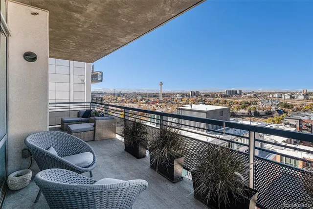 a view of roof deck with seating space and barbeque oven