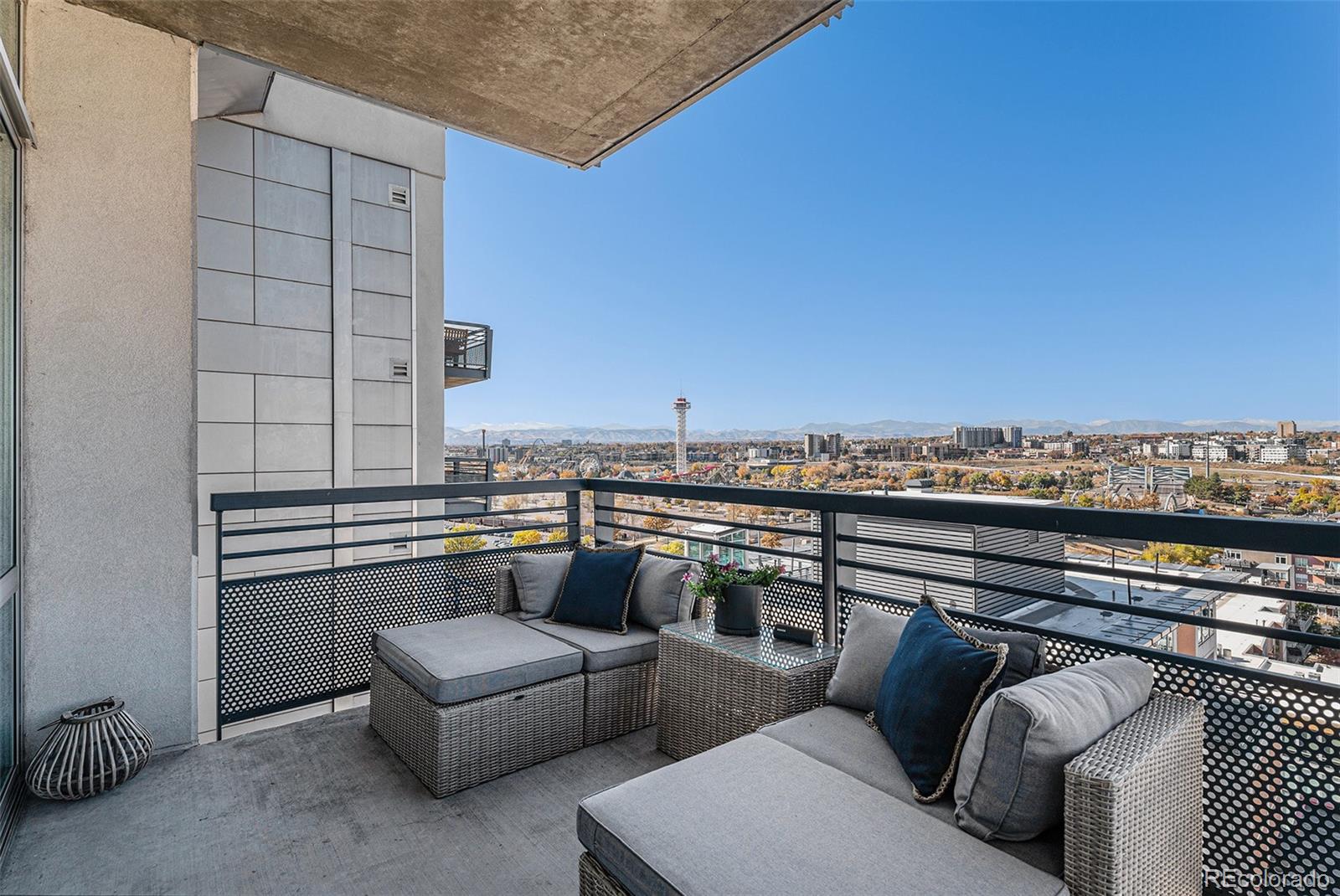 1401 Wewatta Street, Unit 1202 Denver, CO 80202 - Photo 15 of 50 a view of roof deck with couches and potted plants