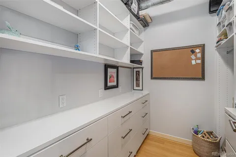 a hallway with cabinets