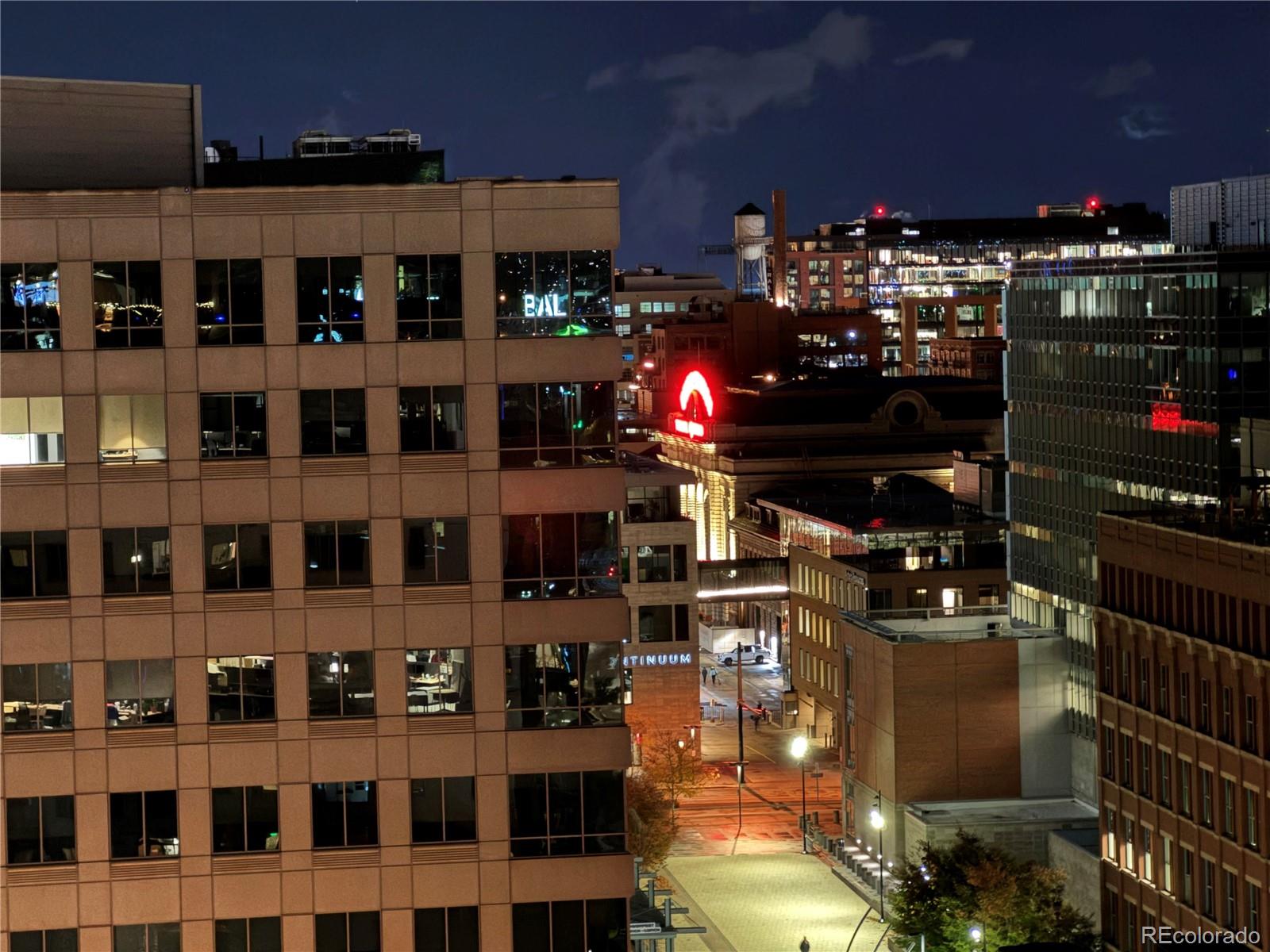 1401 Wewatta Street, Unit 1202 Denver, CO 80202 - Photo 36 of 50 a store area with wine cabinets