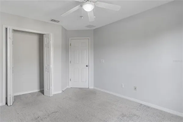 an aerial view of a house having yard swimming pool and outdoor seating