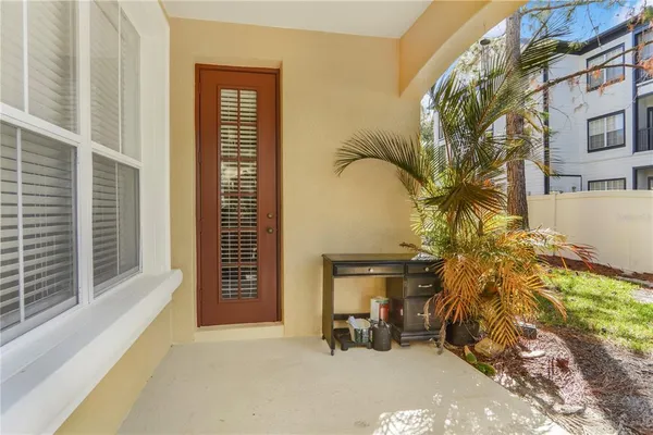 an aerial view of a backyard with couches chair