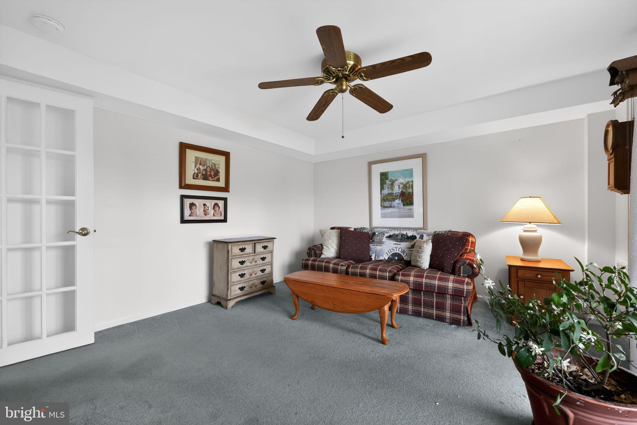 213 Haddonfield Cmns, Unit 213 Haddonfield, NJ 08033 - Photo 28 of 35 Cozy living space with natural light.