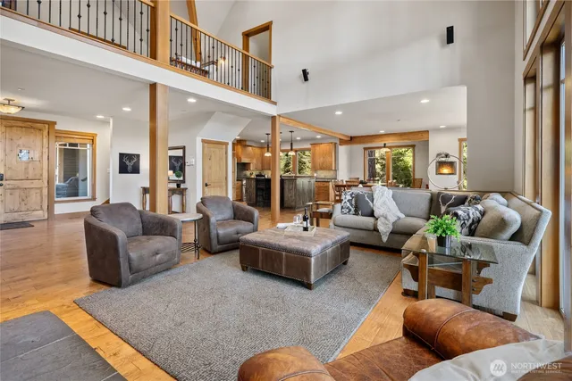 a living room with furniture or couch and a large window