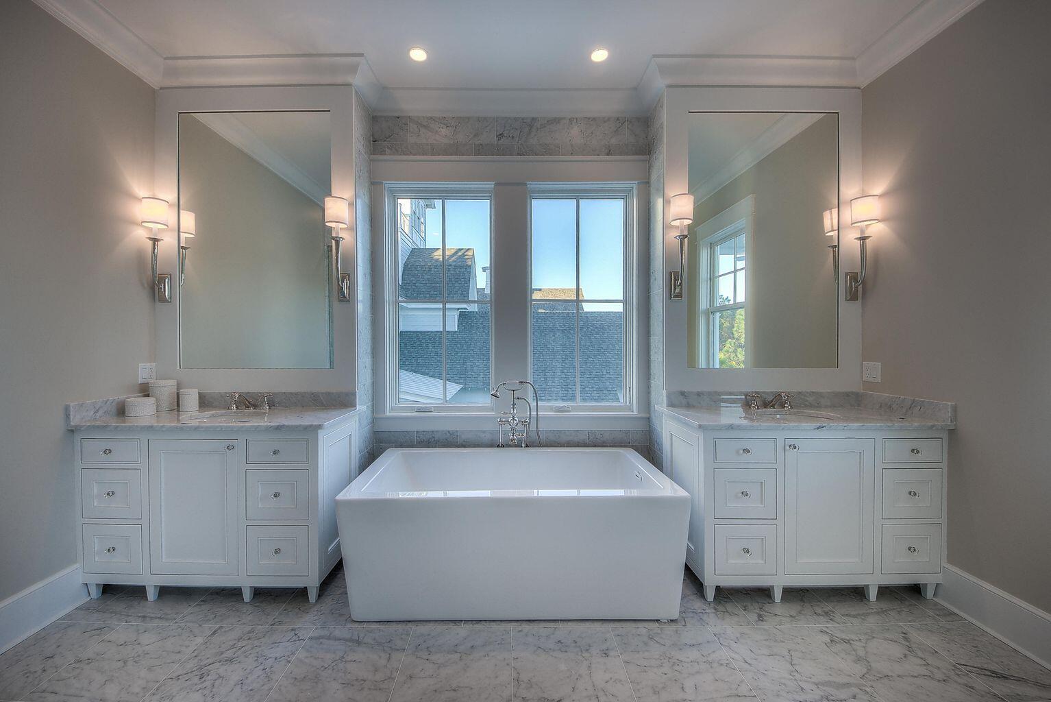 23 Madaket Way Inlet Beach Inlet Beach, FL 32461 - Photo 15 of 49 a spacious bathroom with a tub sink and mirror
