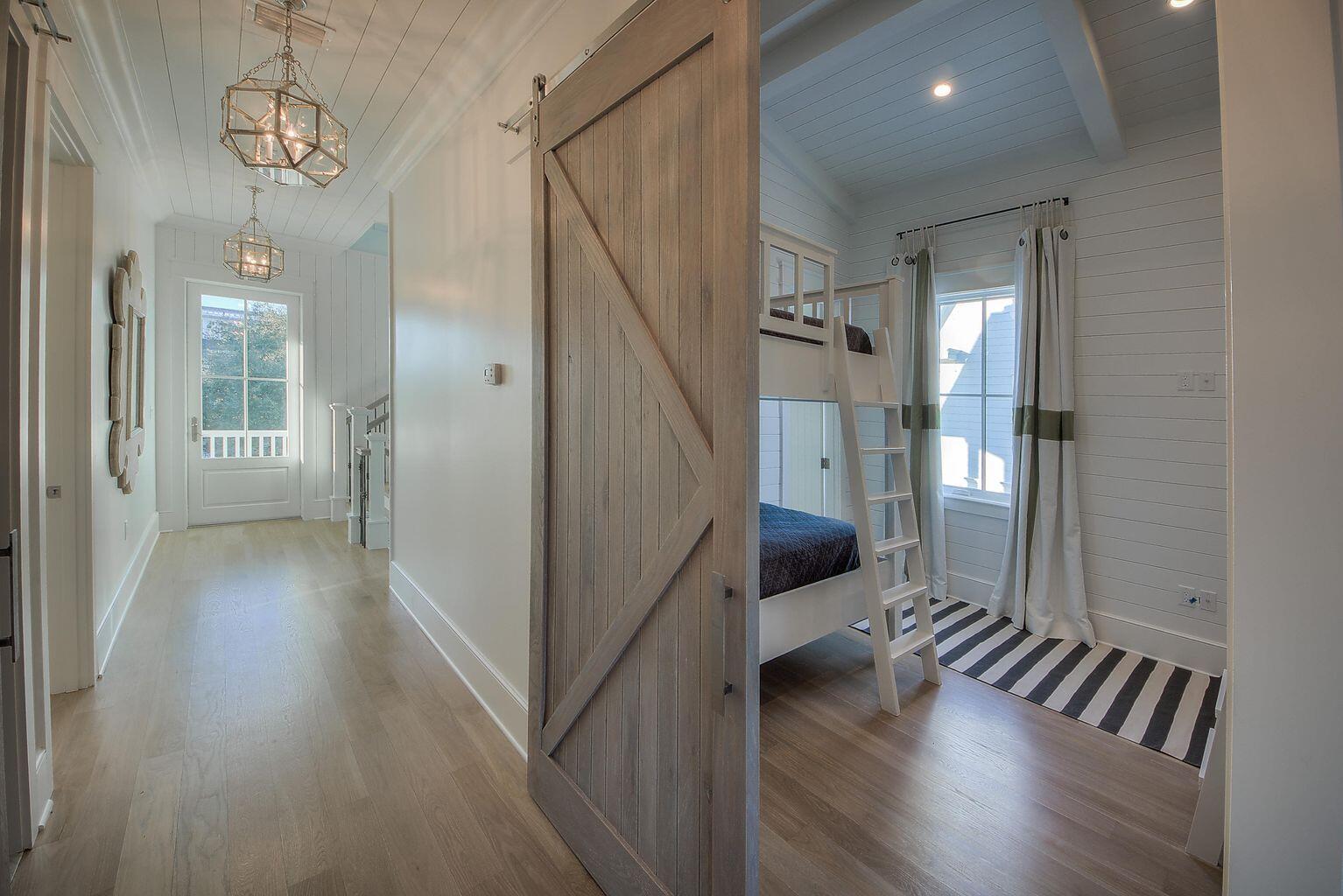 23 Madaket Way Inlet Beach Inlet Beach, FL 32461 - Photo 20 of 49 a view of a hallway view with wooden floor and staircase