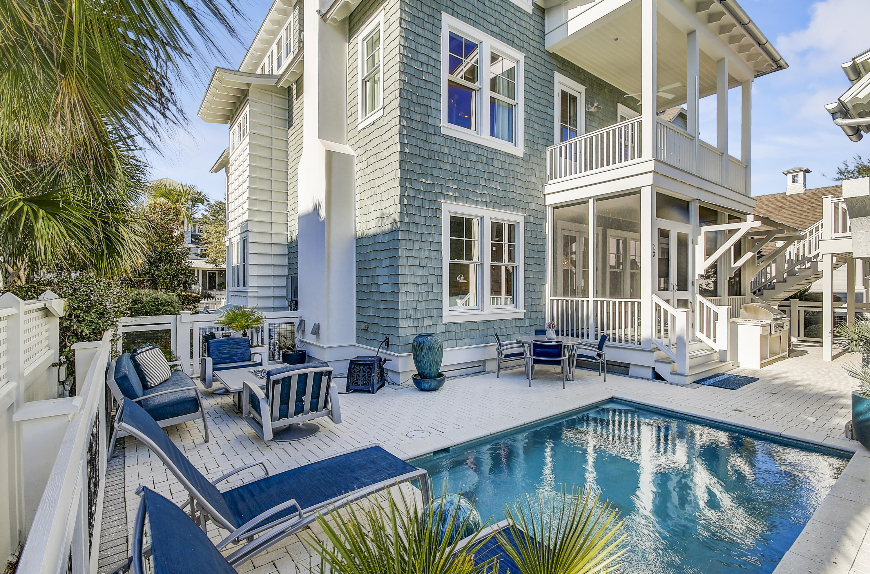 23 Madaket Way Inlet Beach Inlet Beach, FL 32461 - Photo 2 of 49 a view of a patio with couches table and chairs and potted plants