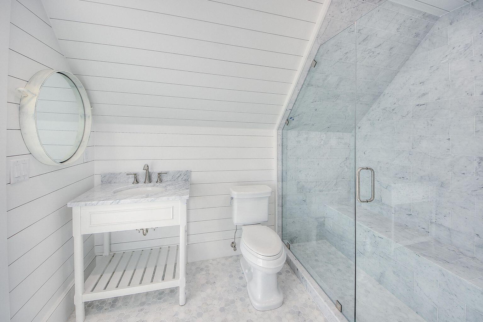 23 Madaket Way Inlet Beach Inlet Beach, FL 32461 - Photo 23 of 49 a bathroom with a toilet a sink and mirror