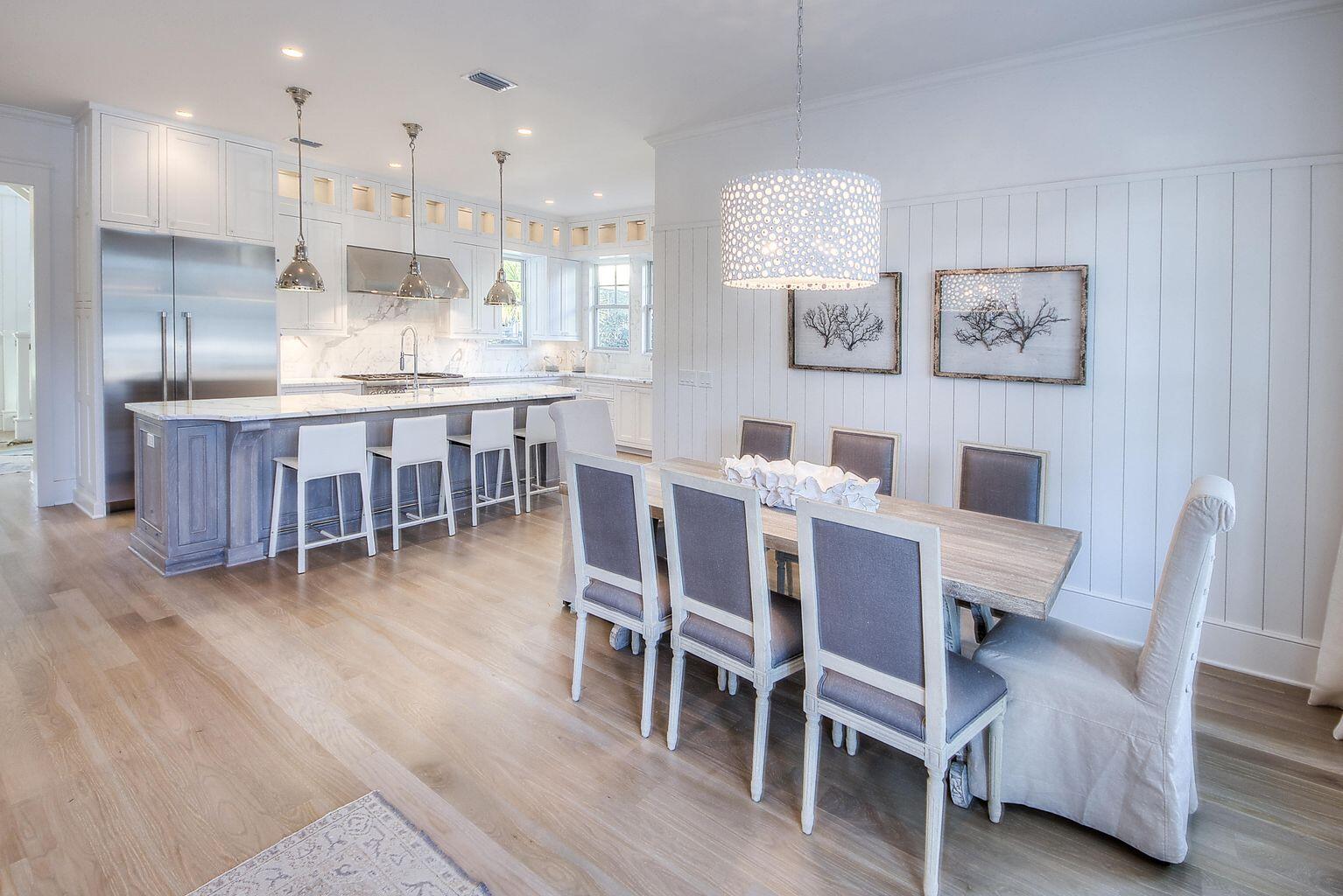 23 Madaket Way Inlet Beach Inlet Beach, FL 32461 - Photo 6 of 49 a dining room with furniture a chandelier and wooden floor
