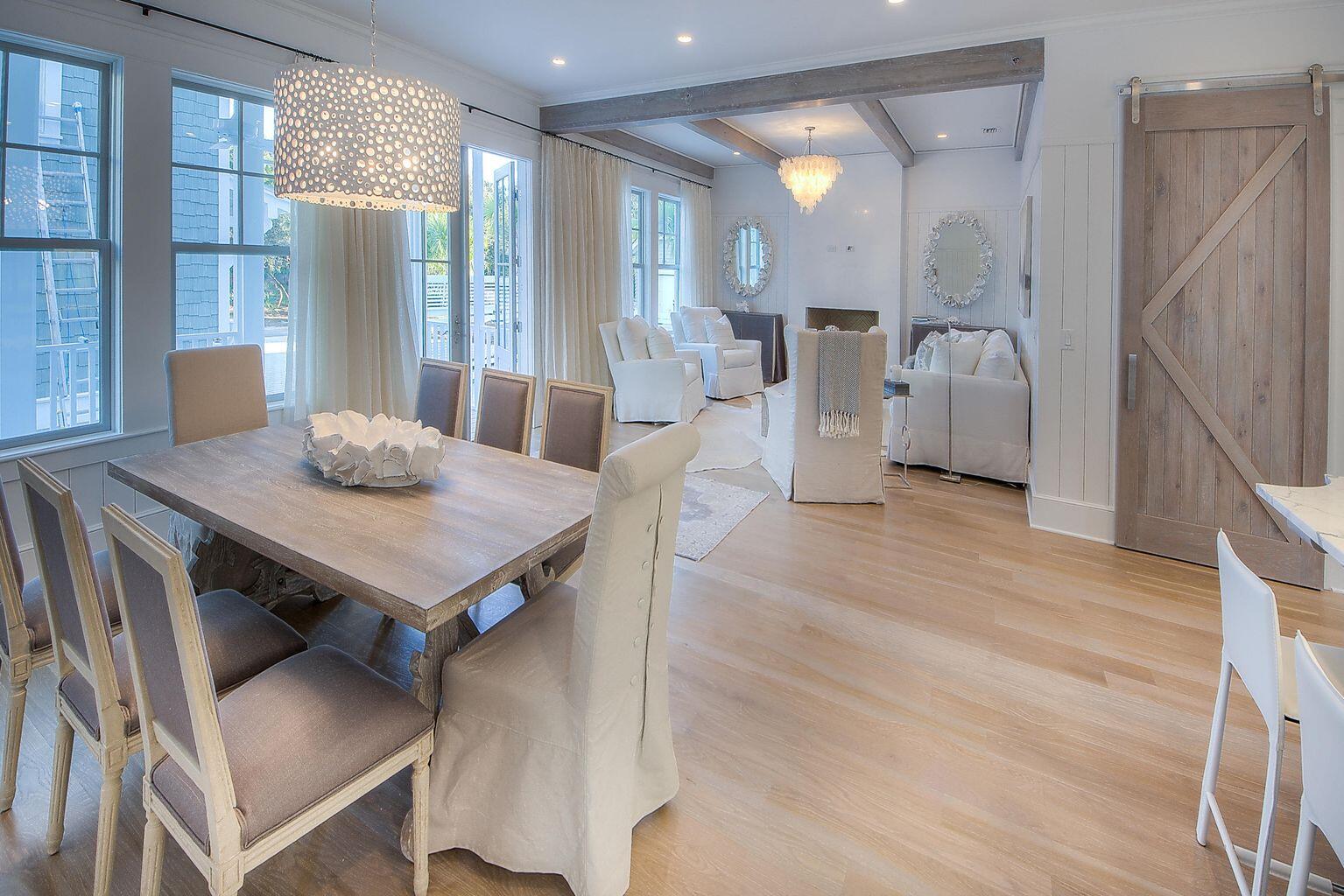 23 Madaket Way Inlet Beach Inlet Beach, FL 32461 - Photo 10 of 49 a living room with furniture a large window and wooden floor