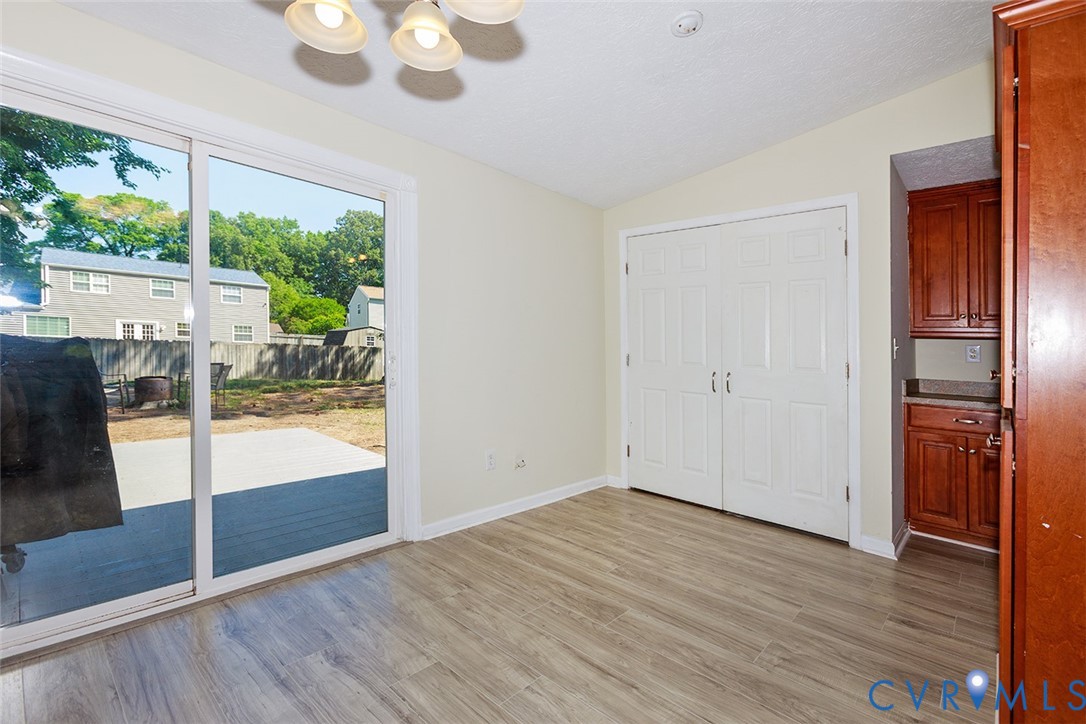 925 Fluvanna Road Newport News, VA 23601 - Photo 7 of 25 a view of empty room with wooden floor and fan