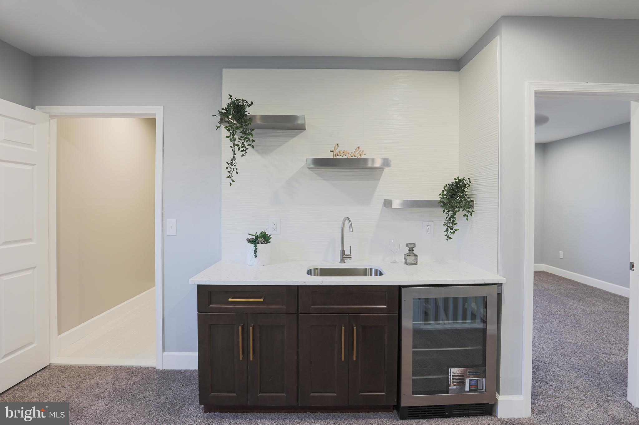 1210 Keithmont Road Baltimore, MD 21228 - Photo 26 of 41 Wet bar in upper level family room!