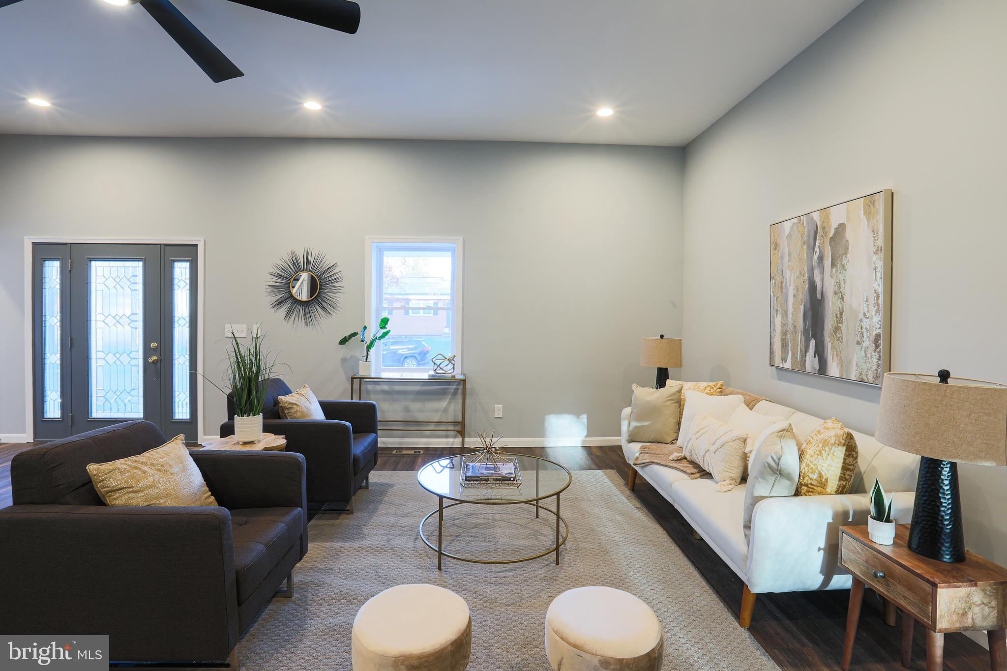 1210 Keithmont Road Baltimore, MD 21228 - Photo 4 of 41 Living room with so much natural light!