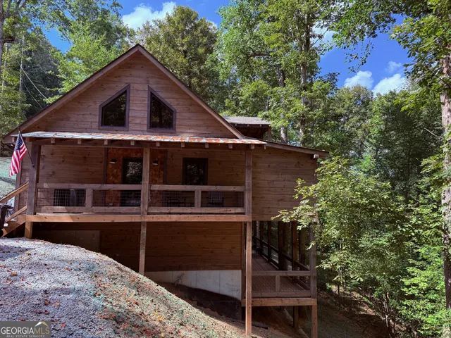 a view of a lake with a yard