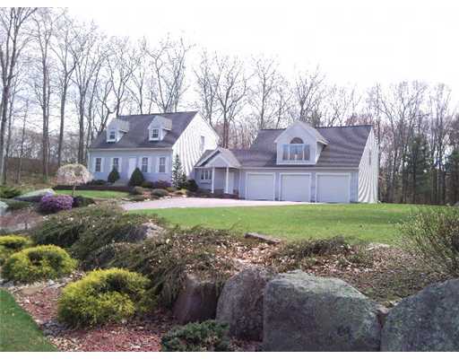 Exterior Front. Beautiful landscaped grounds