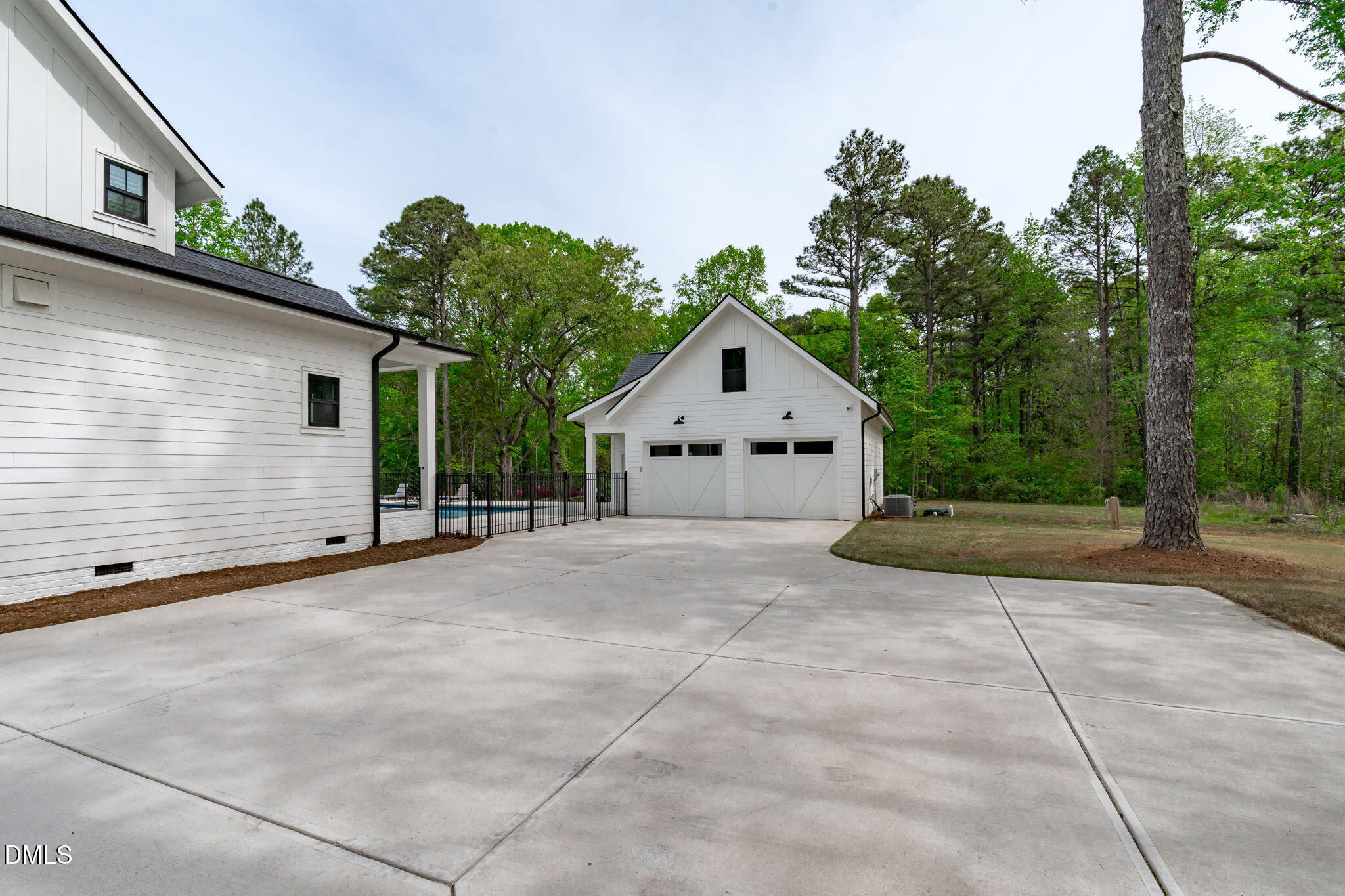 5005 Ten-Ten Road Apex, NC 27539 - Photo 46 of 60 Detached garage with extra parking for multiple vehicles.