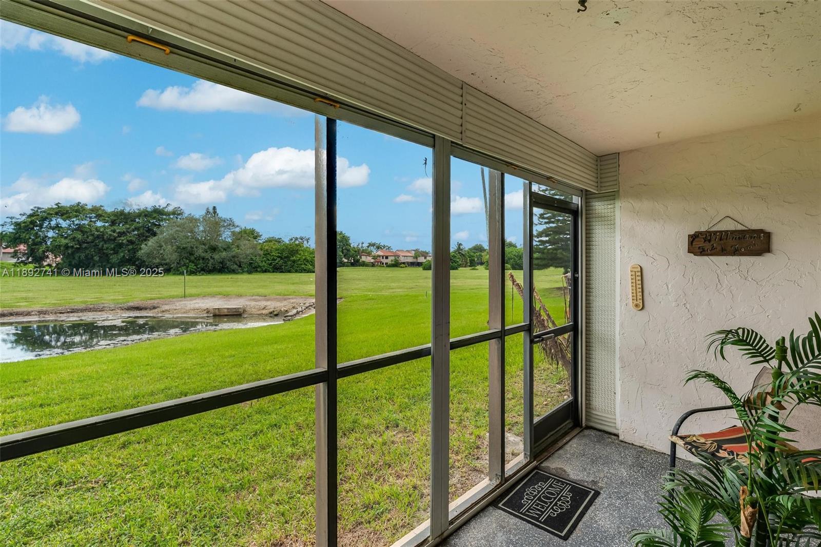 3671 Environ Boulevard, Unit 169 Lauderhill, FL 33319 - Photo 19 of 23 a view of outdoor space with seating area