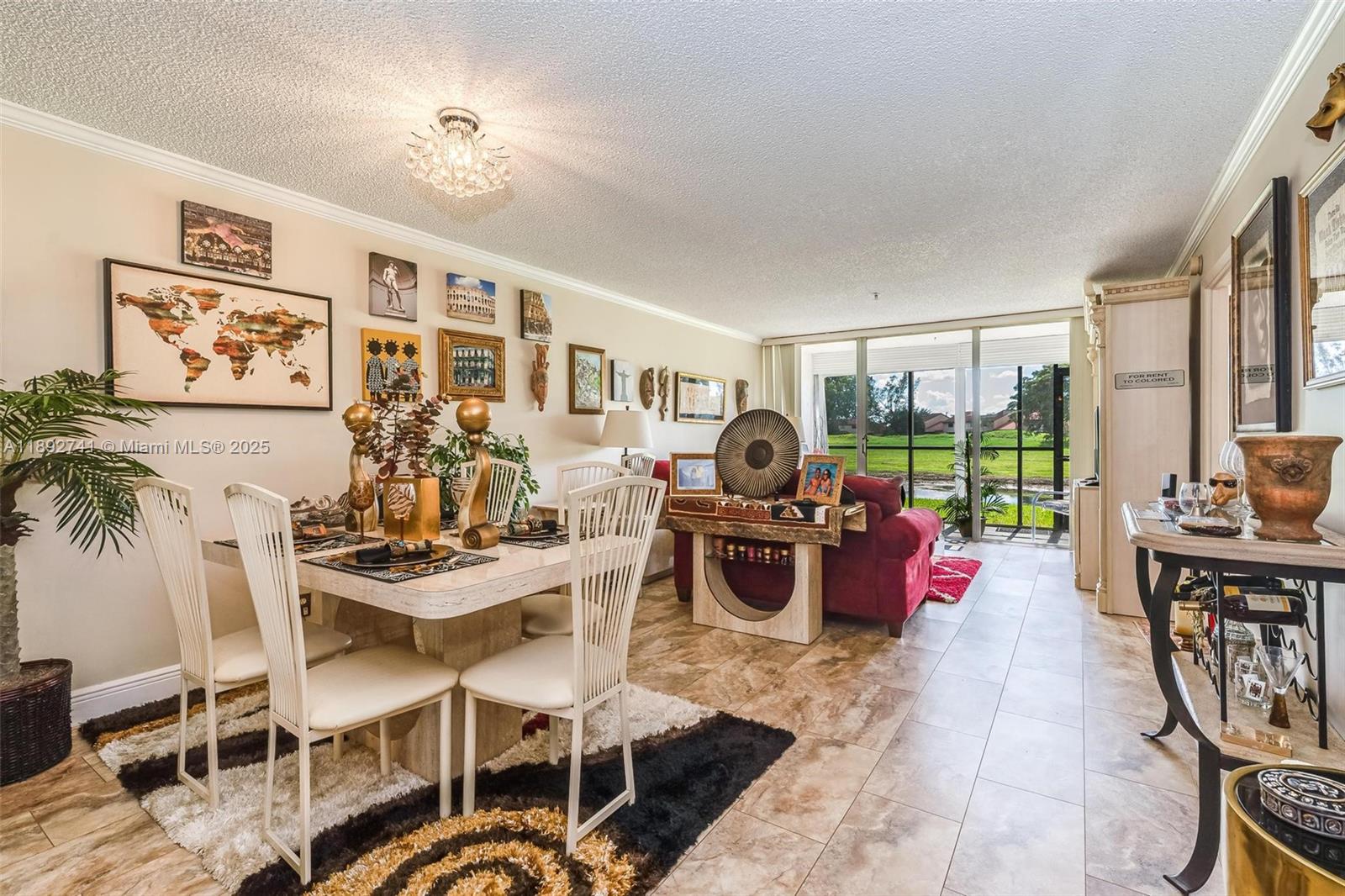 3671 Environ Boulevard, Unit 169 Lauderhill, FL 33319 - Photo 6 of 23 a view of a livingroom with furniture and a window