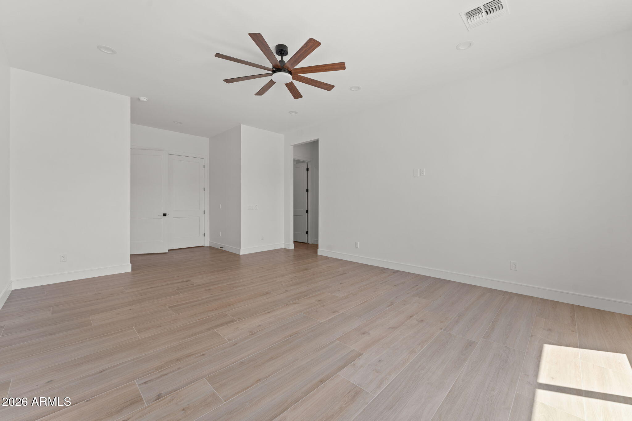 2855 Percheron Road Wickenburg, AZ 85390 - Photo 34 of 58 a view of a room with wooden floor and window
